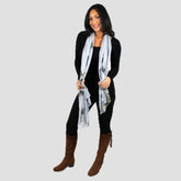 Female model wearing light grey chiffon scarf